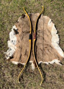 Custom handmade primitive wood bows archery by Stone Age Outdoors in La Crete Northern Alberta